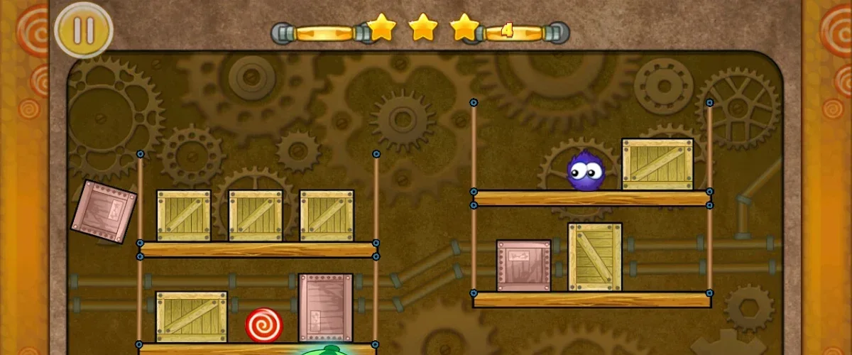 Catch The Candy Premium indoor level built out of rotating wooden gears and crates